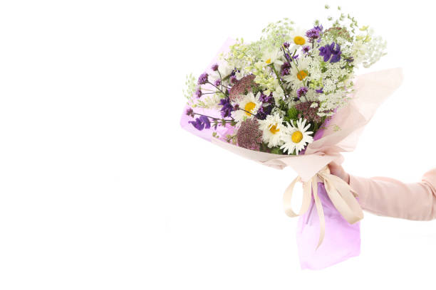 istock Mixed flowers bouquet on white 1413585566
