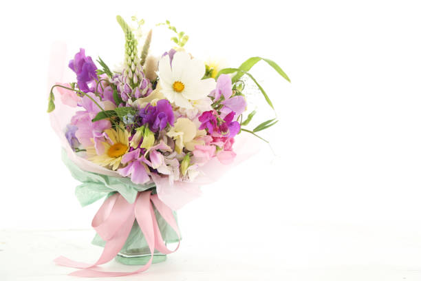 istock Mixed flowers bouquet on white 1413585596