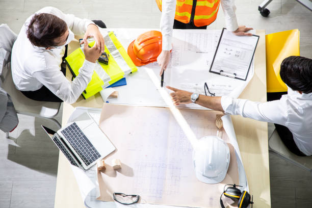 istock Group of engineers are having a planning meeting. 1413586744