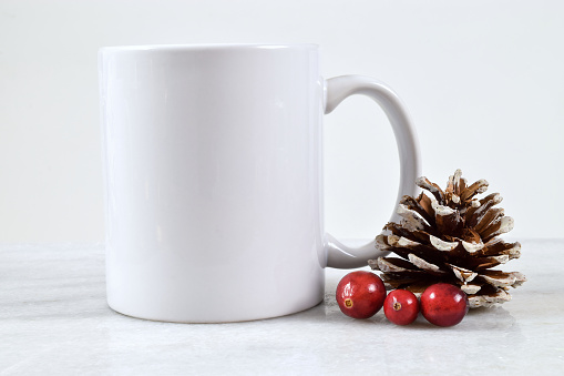 11 oz. Christmas Coffee Cup Mockup with Fresh Cranberries and a Pine Cone
