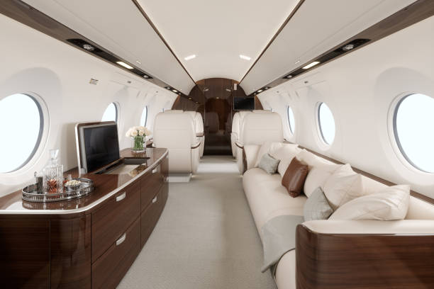 innenraum des leeren corporate jets - firmenflugzeug stock-fotos und bilder