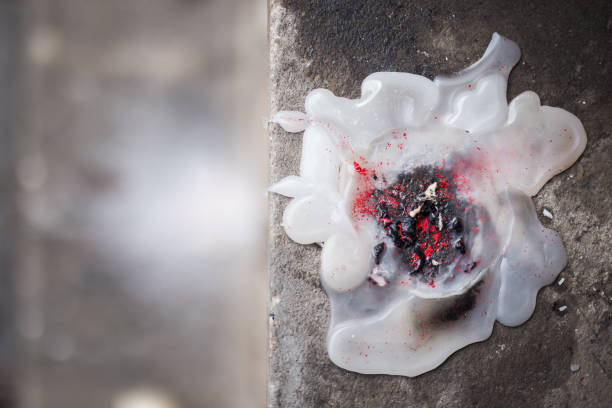 Pictures of candle lights blight and burning in temple of Thailand country with concept region of people.