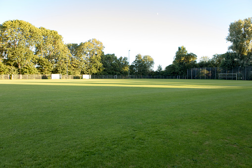 A corner view of a rugby field and its goal posts.