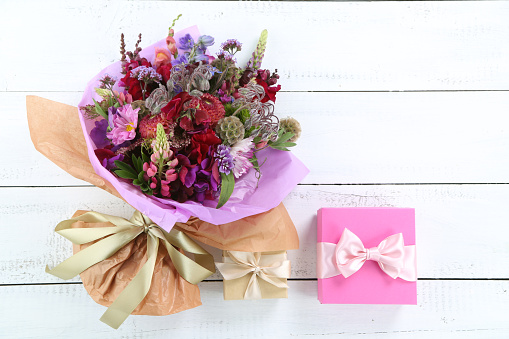 Mixed flowers bouquet flat lay