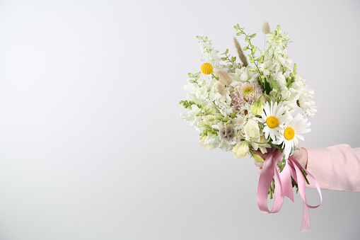 Mixed flowers bouquet on white