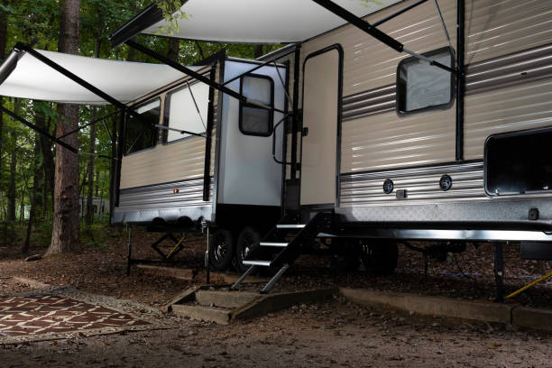 istock Camping trailer set up for a weekend in North Carolina 1413597078