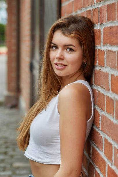 istock attractive tan woman 1413598789