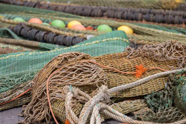 Colored nets and ropes on a quay of a Dutch harbour