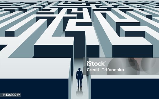 istock Businessman stands in front of a labyrinth. 1413600219