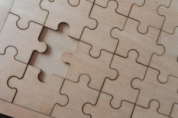 istock jigsaw on the floor. concept of missing and key success 1413600745
