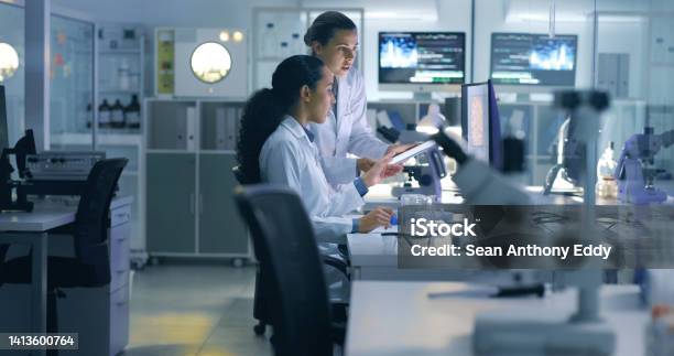 Drug Trial Medical Research Or Examination Of A Scan Being Done By Doctors Researchers Or Scientists In A Lab Experts Medical Professionals Or Biologists Talking And Discussing Results Of A Test Stock Photo - Download Image Now
