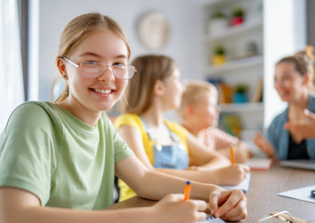 istock Happy kids at school 1413600822