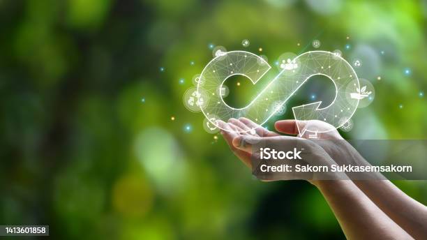 Hand Held Circular Economy Icon The Concept Of Eternal Circular Economy Endless And Unlimited For Future Business Growth And Design For Reuse And Environmental Sustainability Stock Photo - Download Image Now