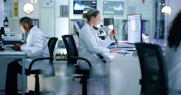 istock Research, results and tests being done by doctors in a lab 
while working on computers together. Medical researchers collaborating and researching to find a cure for disease and illness at work 1413601946