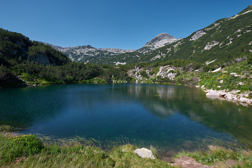 Beautiful Lake in the Pirin mountains with blue clear water. Bansko, Bulgaria.