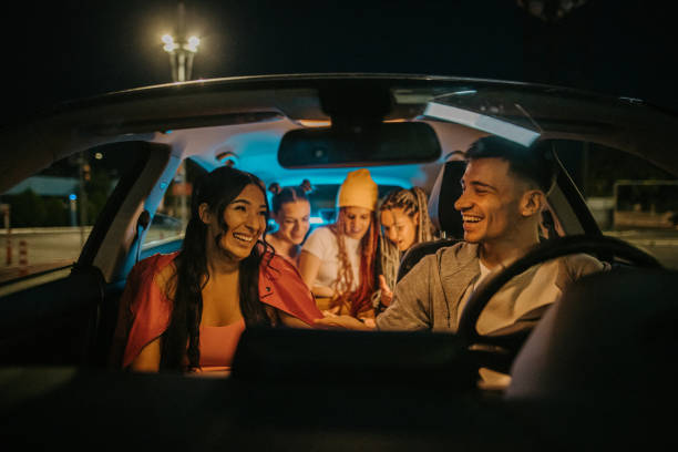 istock Friends sitting in car together 1413603763