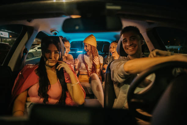istock Friends sitting in car 1413604426