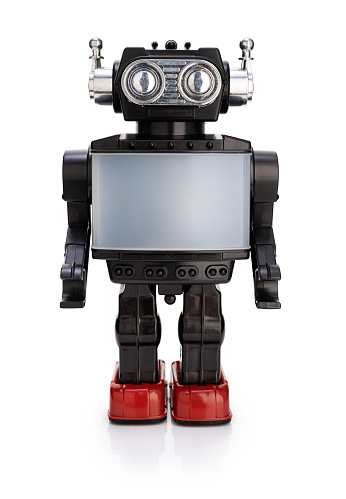 Vintage retro robot with blank screen isolated on white background. Plastic and metal made from 70s