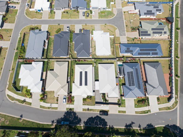 istock Aerial view, looking down on new houses in modern Cairns housing development 1413607507