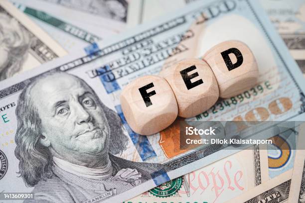 Fed Wording With Up And Down Arrow On Usd Dollar Banknote For Federal Reserve Increase And Decrease Interest Rate Control Which Effect To America And World Economic Growth Concept Stock Photo - Download Image Now