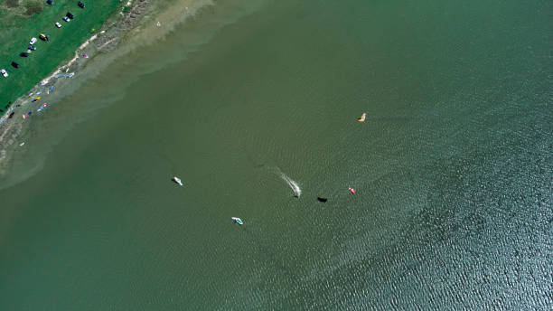 istock Windsurfing camp on a lake shore. 1413609475
