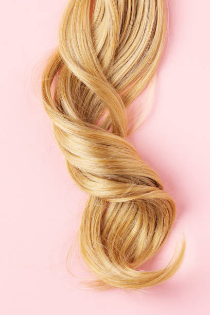 istock Long golden blond curly hair. 1413612475