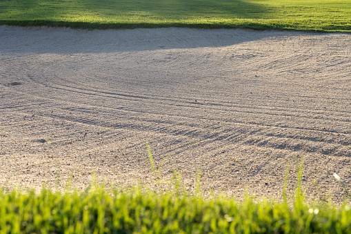 Closer look at empty Golf course bunker