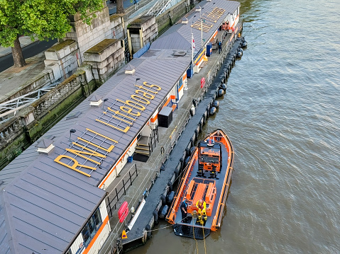 The River Thames at Westminster, London, England.  This is the RNLI station on the North Bank which is called by the coastguard if there are any river incidents.