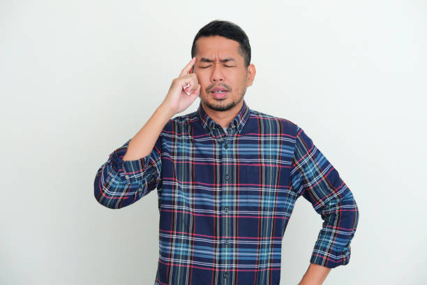 istock Adult Asian man showing try to remember something gesture 1413621815