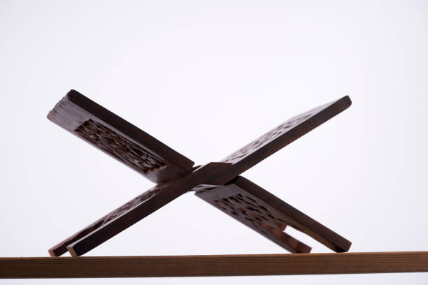 istock Wooden Quran stand called Rehel on white background 1413623974