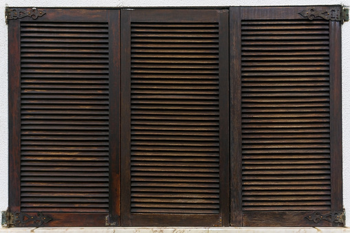 Close-up of a shuttered windows to a building in Strasbourg, France