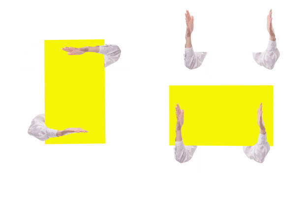 position of female hands support yellow sign