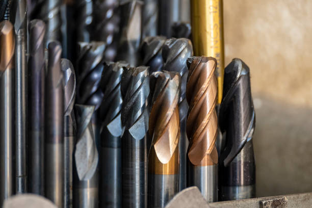 istock Close-up scene the group of used cutting tools for CNC milling machine. 1413634022