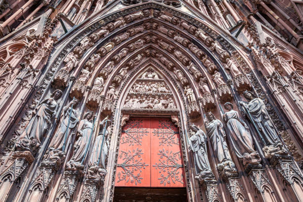 Strasbourg Notre Dame gothic cathedral ornate portal, Alsace, France Strasbourg Notre Dame gothic cathedral ornate portal, Alsace, Eastern France notre dame de strasbourg stock pictures, royalty-free photos & images