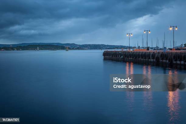 Oslofjord At Evening With Dramatic Sky And Pier Oslo Norway Stock Photo - Download Image Now