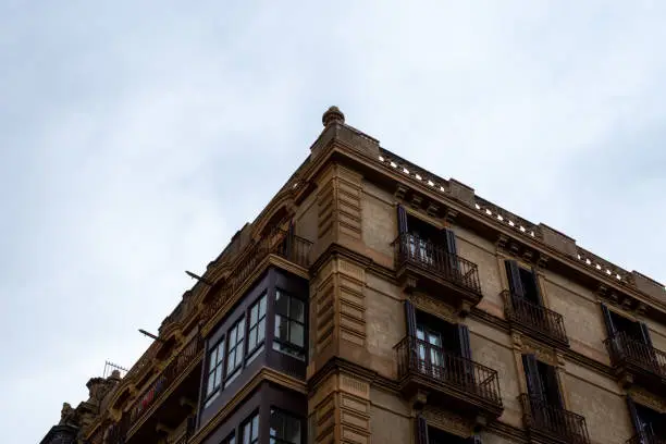 Photo of buildings of the city of barcelona, sad and old part, monumental