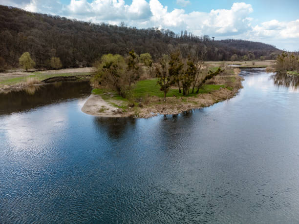 istock Spring aerial view on river curve, Zmiiv Ukraine 1413645496