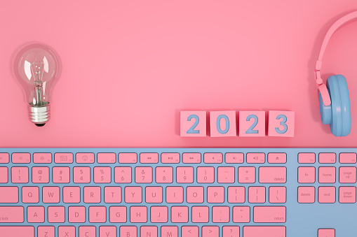 3D rendering 2023 text on top view of workplace with keyboard, Technology Idea New Year Christmas Concept. Flat Lay.