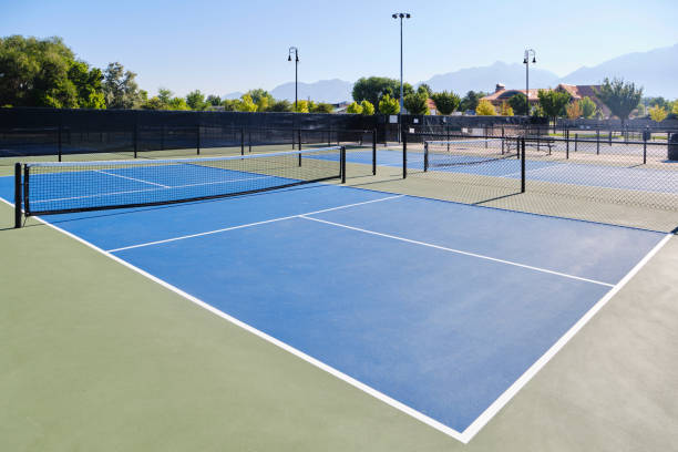 Pickleball Court in a Public Park An empty Pickleball court in a public park. sports court stock pictures, royalty-free photos & images