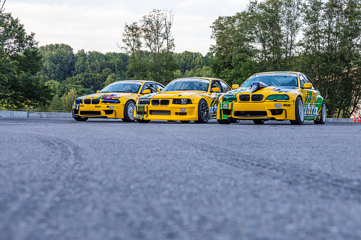 BMW drift race cars on the asphalt at the drift show. Alytus, Lithuania, 1 July 2022.