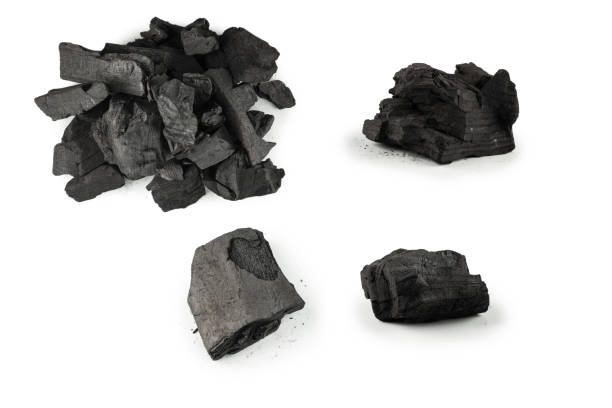 istock Black oak coal isolated on white background. 1413650007