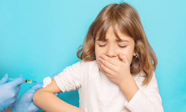 istock Girl Taking Vaccination From Doctor 1413651434