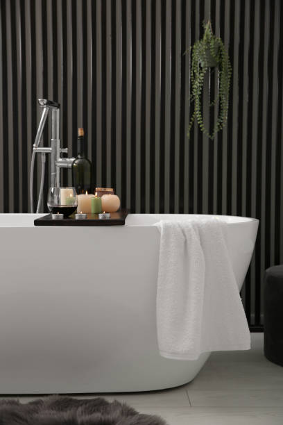 istock Stylish bathroom interior with modern white tub 1413653540