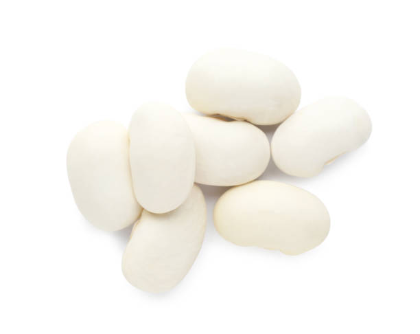 istock Pile of uncooked navy beans on white background, top view 1413653558