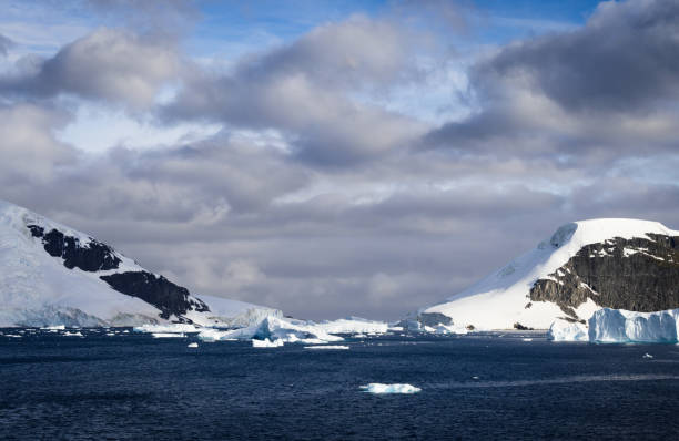 istock Channel Blocked by Large Icebergs in Antarctic Peninsula 1413656214
