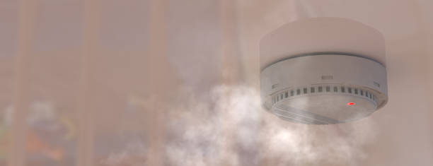 istock Smoke detector mounted on roof in apartment. 3d rendering 1413656505