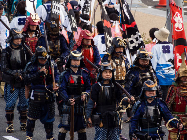 Historical reenactment arquebus firearms squad during the 59th annual Nobunaga Festival parade stock photo
