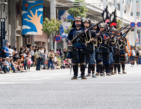 Gifu, Japan - October 4, 2015: Historical reenactment arquebus firearms squad during the 59th annual Nobunaga Festival parade