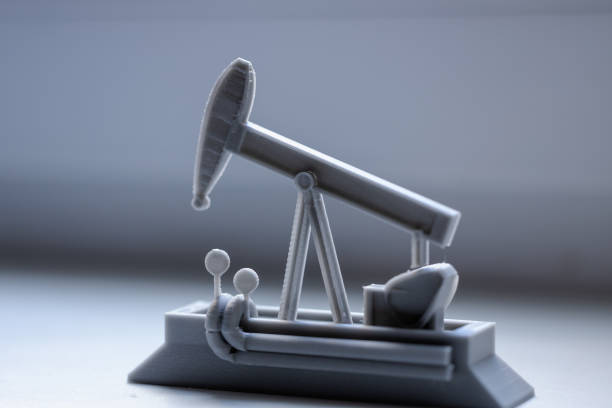 istock Oil derrick. 3D printing. oil rig plastic model 1413656843