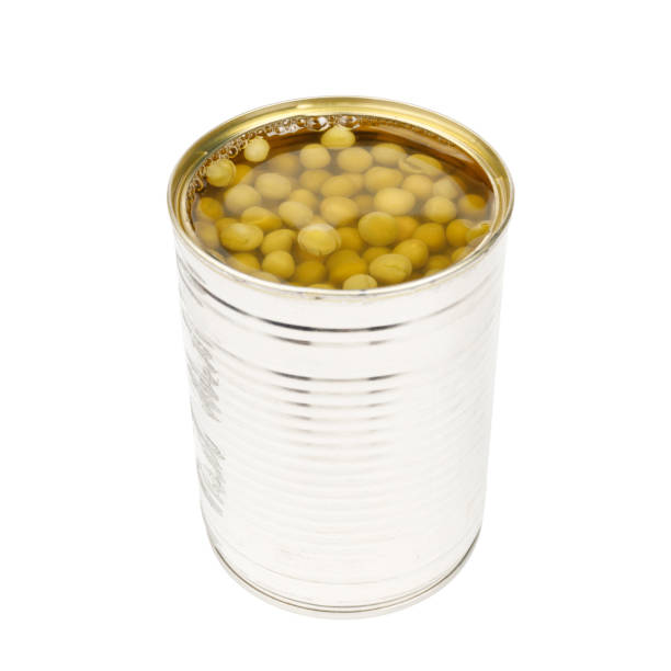 istock Canned green peas on a white background. 1413662300